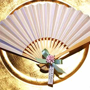Paper Fan with Personalized Tag, Satin Ribbon, and Decorative Embellishment - Assembled For You